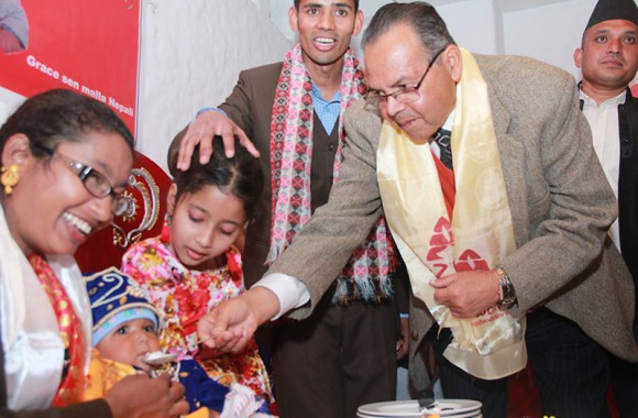 guest feeding food to child