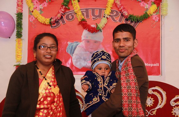 parents happy with their child weaning ceremony