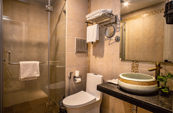 deluxe washroom arushi hotel