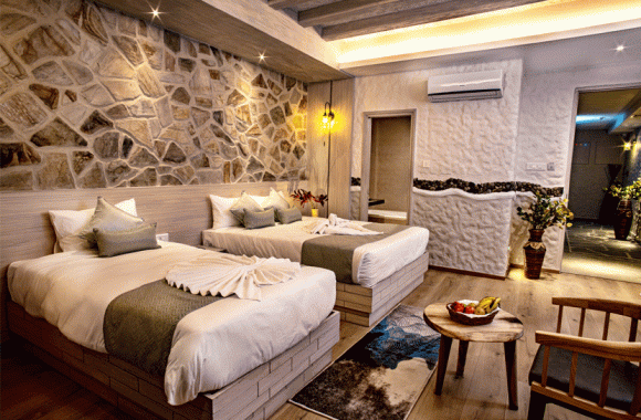 luxurious deluxe bedroom arushi boutique hotel